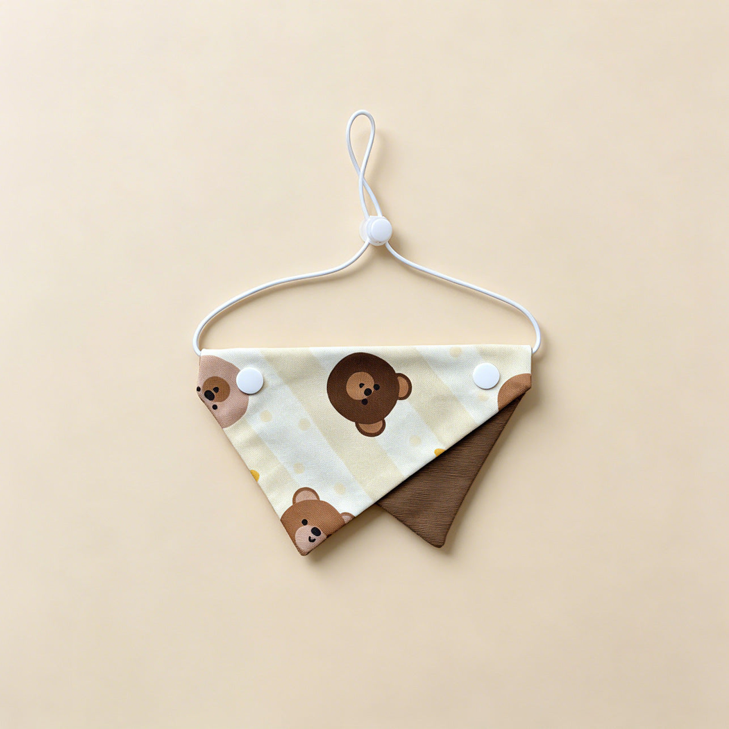 Brown Bear Pet Neckwear with bear faces, brown underpanel and white cord.