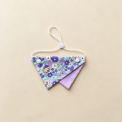 Purple Flowers Pet Neckwear with floral and cartoon motifs, lavender underpanel and white cord.