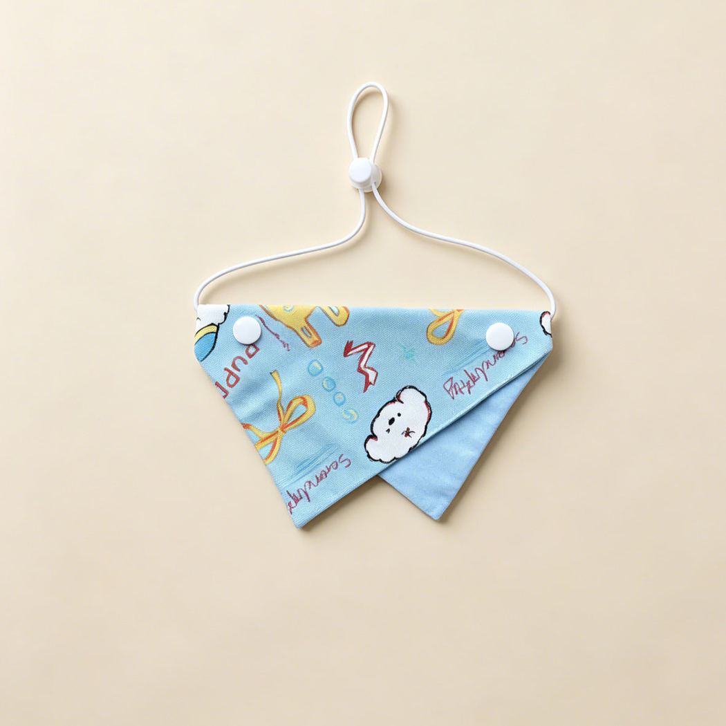 Puppies Pet Neckwear with blue cartoon print, yellow bows and a white cord.