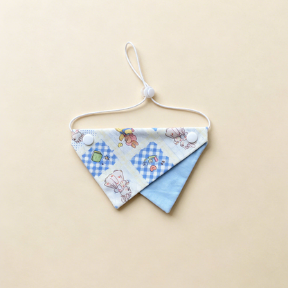 Blue Rabbit Pet Neckwear with rabbit and gingham patchwork print, blue underpanel and white cord.