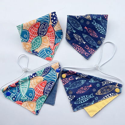 Fish-pattern pet neckwear in navy and multicolor bib and bandana styles
