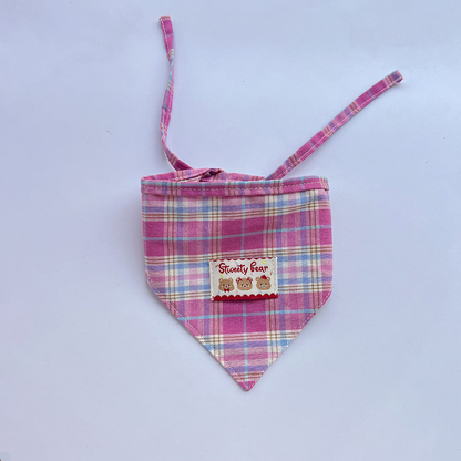 Pink plaid Pet Neckwear with a triangular front, bear patch, and extended ties.