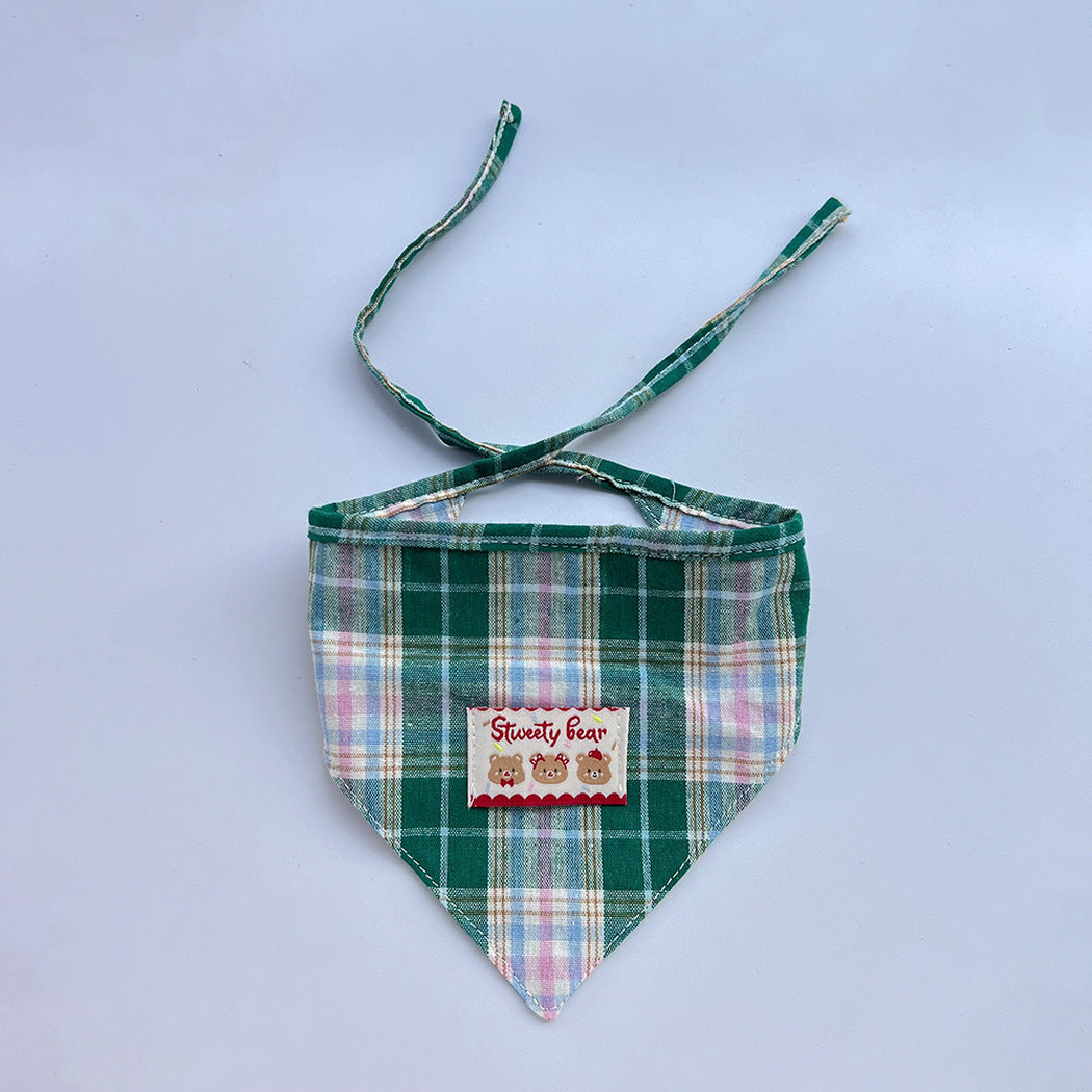 Green plaid Pet Neckwear with a triangular front, bear patch, and crossed ties.