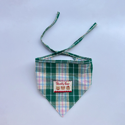 Green plaid Pet Neckwear with a triangular front, bear patch, and crossed ties.