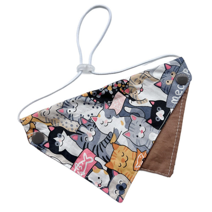 Crowded Bib pet neckwear with cartoon cats, a brown reverse panel, and a looped neck cord.