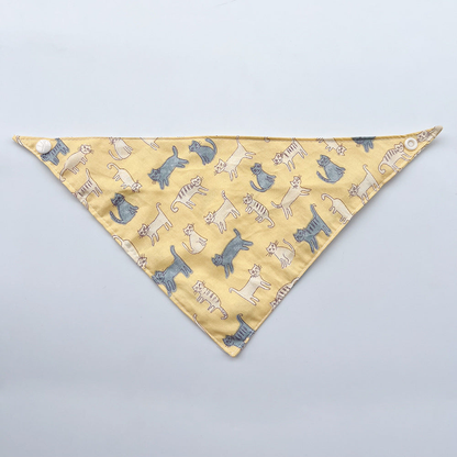 Scattered Bandana pet neckwear spread flat, with cats on yellow and white corner snaps.