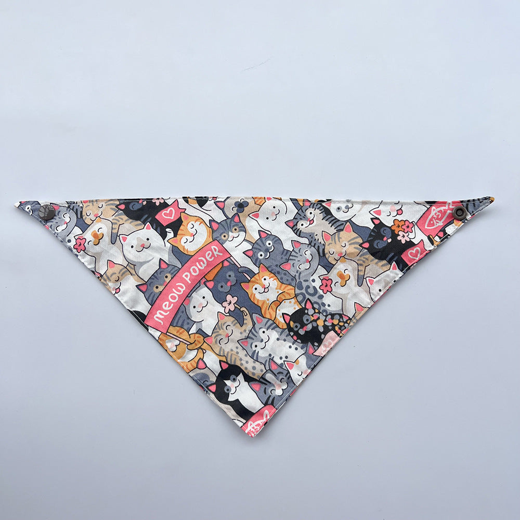 Crowded Bandana pet neckwear spread flat, with colorful cartoon cats and dark corner snaps.