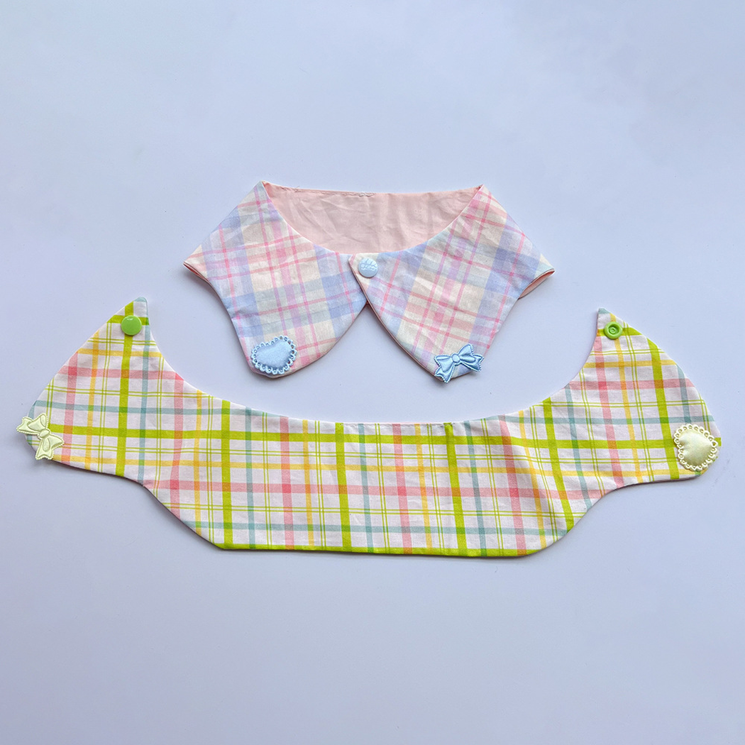 Blue-accented plaid Pet Neckwear beside an opened yellow-accented piece showing the band and snap ends.