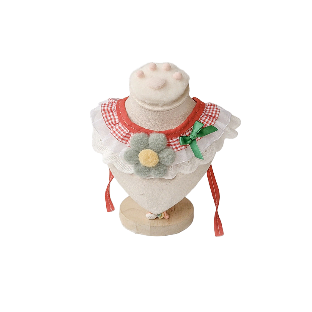 Gray Flower Pet Neckwear with red gingham, a gray flower, green bow, and red ties on a display stand.