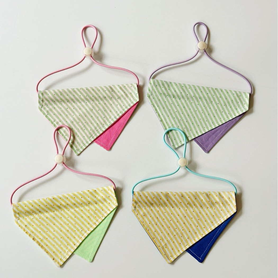 Striped triangular Pet Neckwear in four color combinations with contrasting lower panels and colored neck loops.