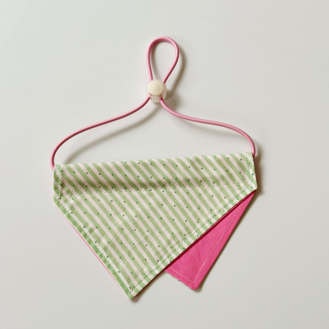 Green / Fuchsia Pet Neckwear with diagonal stripes, overlapping triangular panels and a pink neck loop.