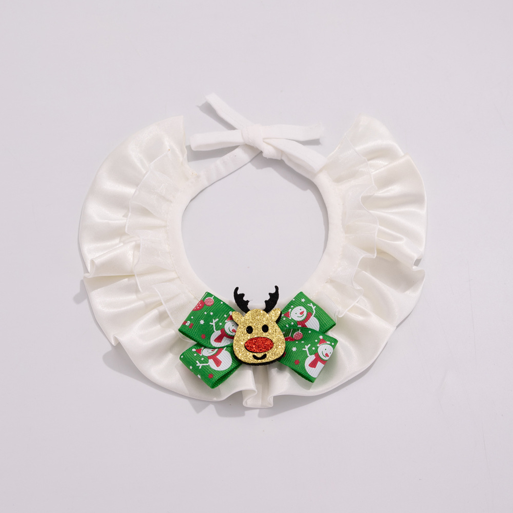 Reindeer pet neckwear with white ruffles, a green snowman-patterned bow, and a glittery reindeer face.