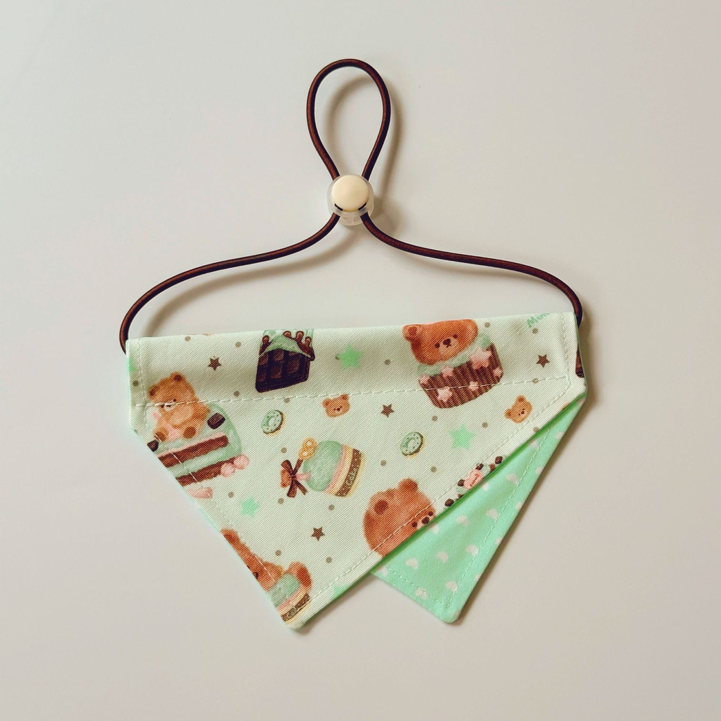Bear style Pet Neckwear with mint triangular panels, bear and dessert motifs, and a dark cord loop.