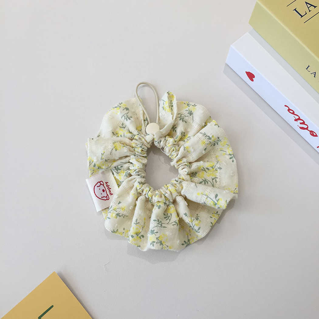Yellow Floral Pet Neckwear with gathered circular ruffles and a loop with a round slider.