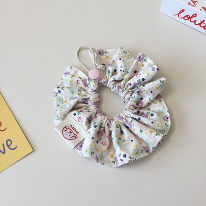 Light Purple floral ruffled Pet Neckwear with a gathered center, loop, and round pale purple disk.