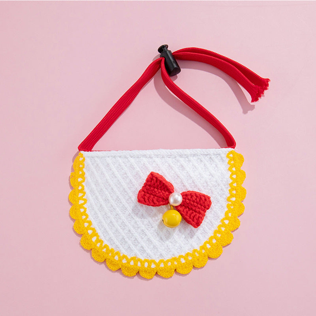 Yellow Bow Pet Neckwear with a red bow, yellow bell, scalloped yellow trim, and red neck strap.