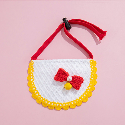 Yellow Bow Pet Neckwear with a red bow, yellow bell, scalloped yellow trim, and red neck strap.
