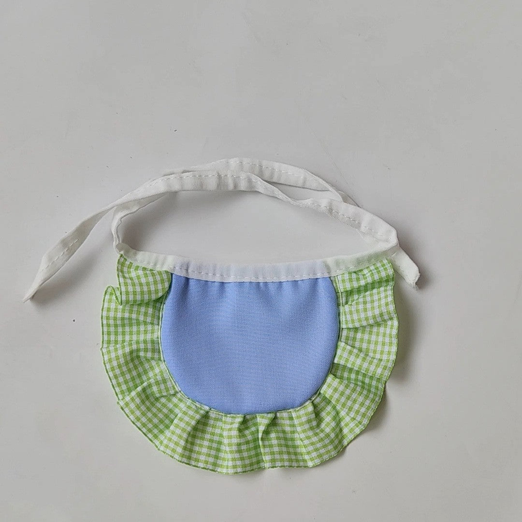 Reverse view of green gingham Pet Neckwear with a smooth blue center panel and white tie straps.