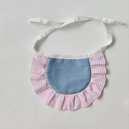 Pink Pet Neckwear with a blue center panel, gingham ruffle, and white tie straps.