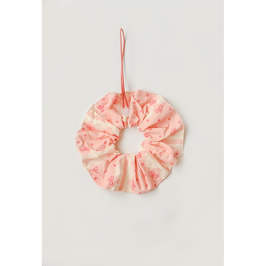Pink Bow Pet Neckwear with bow and dot patterns, a gathered ruffle, and red loop cord.