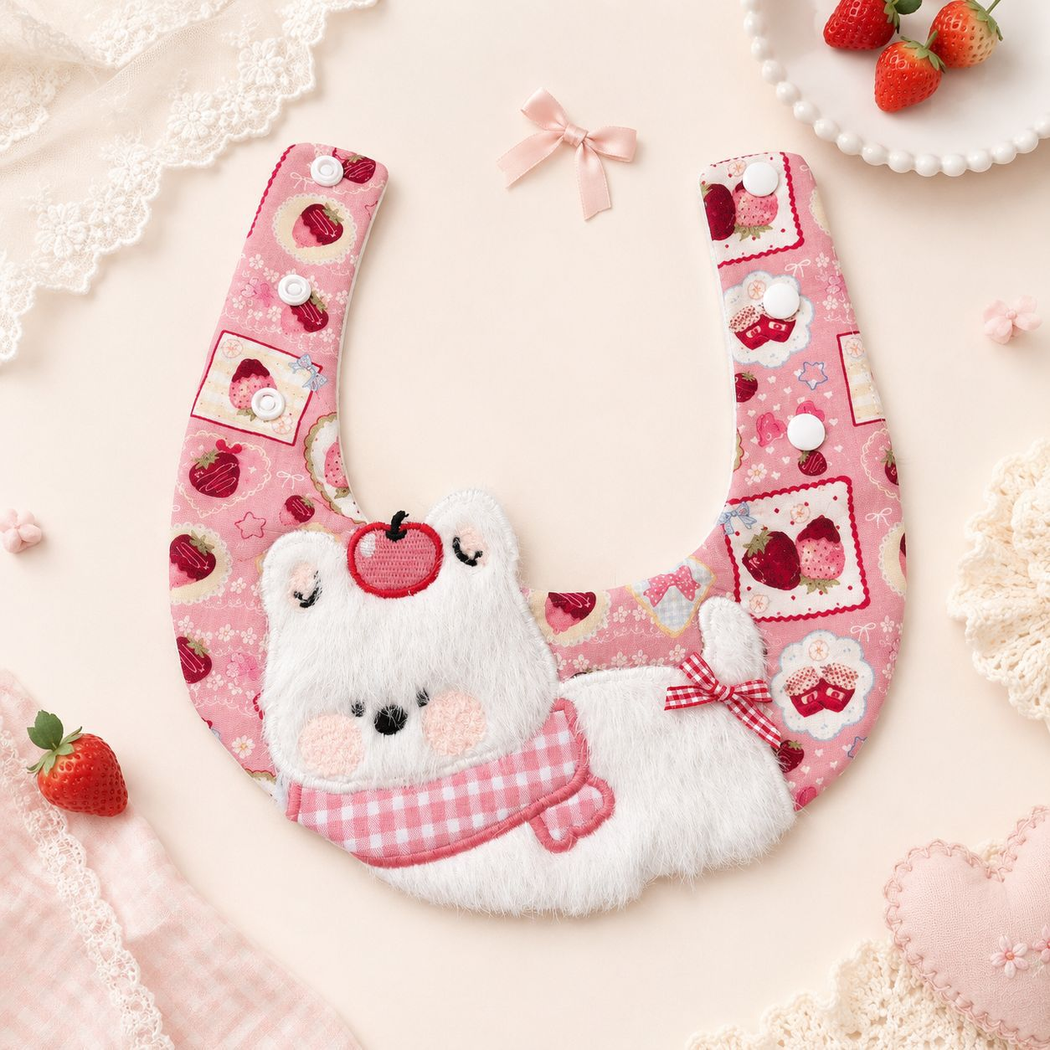 Strawberry Puppy Pet Neckwear laid open with extended straps and three snap fasteners on each side.