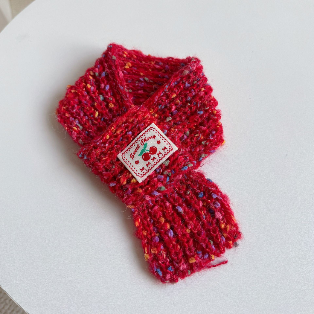 Red Cherry pet neckwear with multicolored flecks and a tapered hanging end