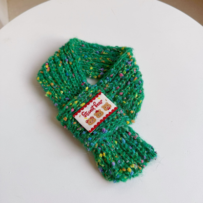 Green Teddy Bear pet neckwear with multicolored flecks and a tapered hanging end