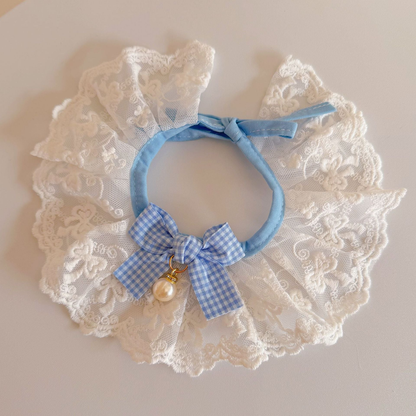 Light Blue lace pet neckwear with blue gingham bow and pearl-like bead, front view