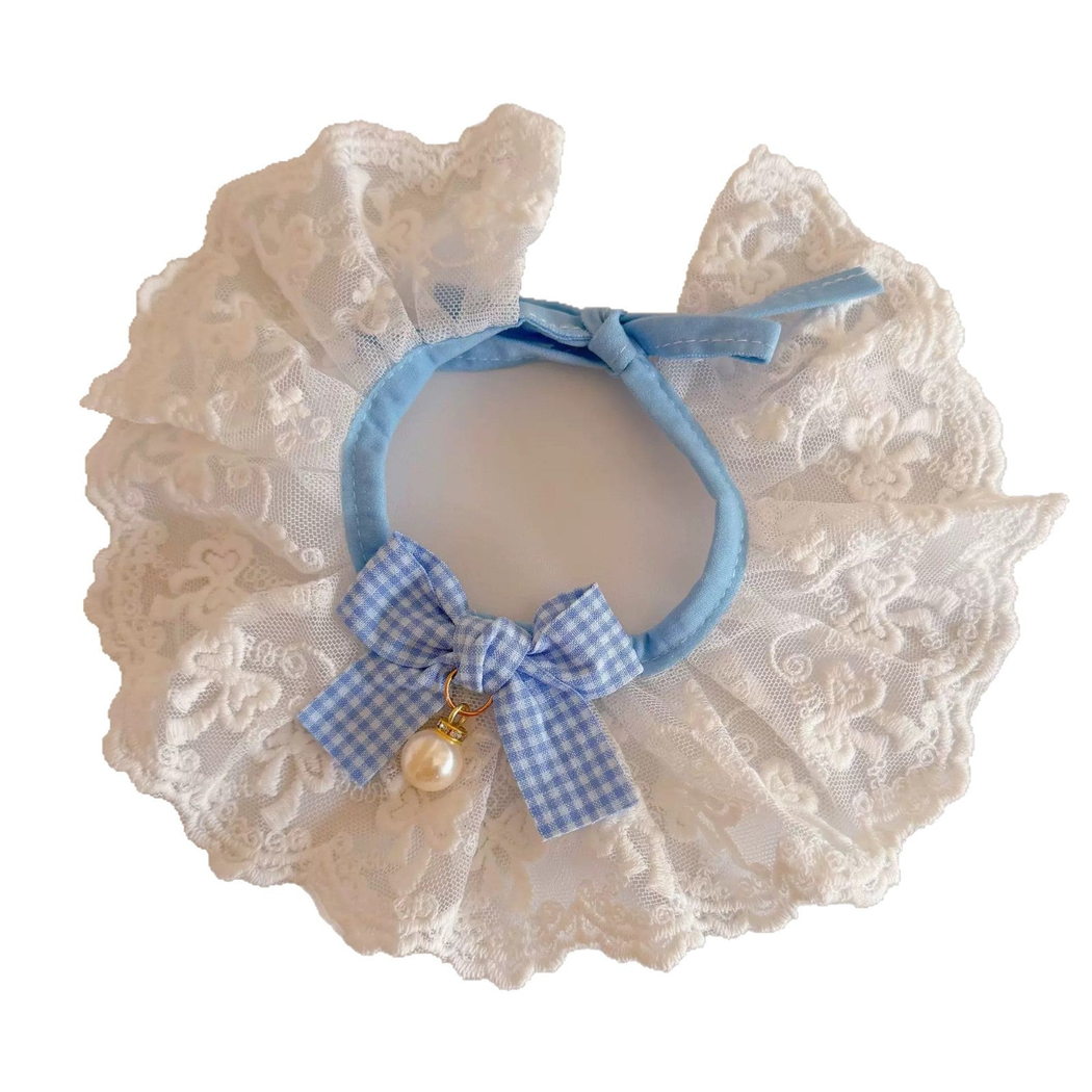 Light Blue and white ruffled pet neckwear with a checkered bow on a white background