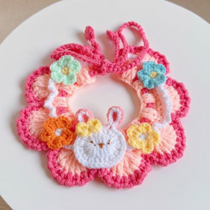 Pink Bunny pet neckwear with a bunny-face ornament and flowers, front view