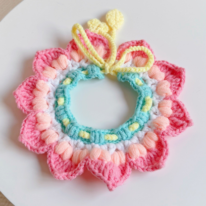 Lotus pet neckwear with layered petals and a mint inner ring, front view