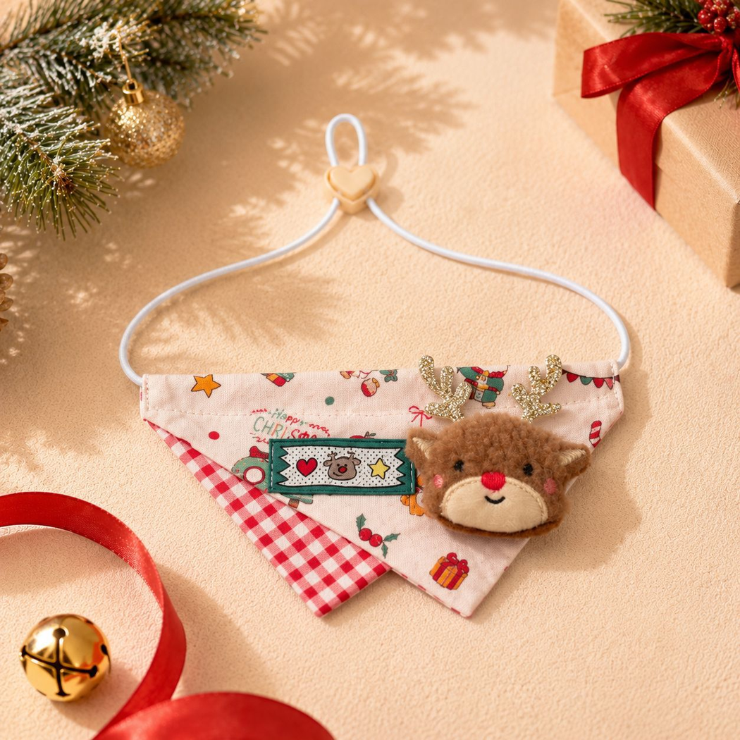 Reindeer pet bandana with a plush reindeer decoration and gold-tone antlers