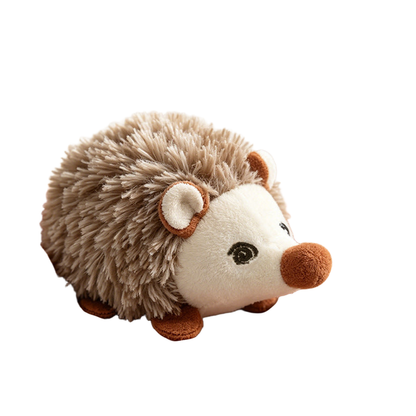 Gray hedgehog-shaped cat toy held in a hand
