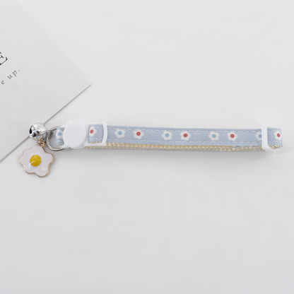 Blue Flowers pet collar with cat-shaped slider, bell, and flower charm