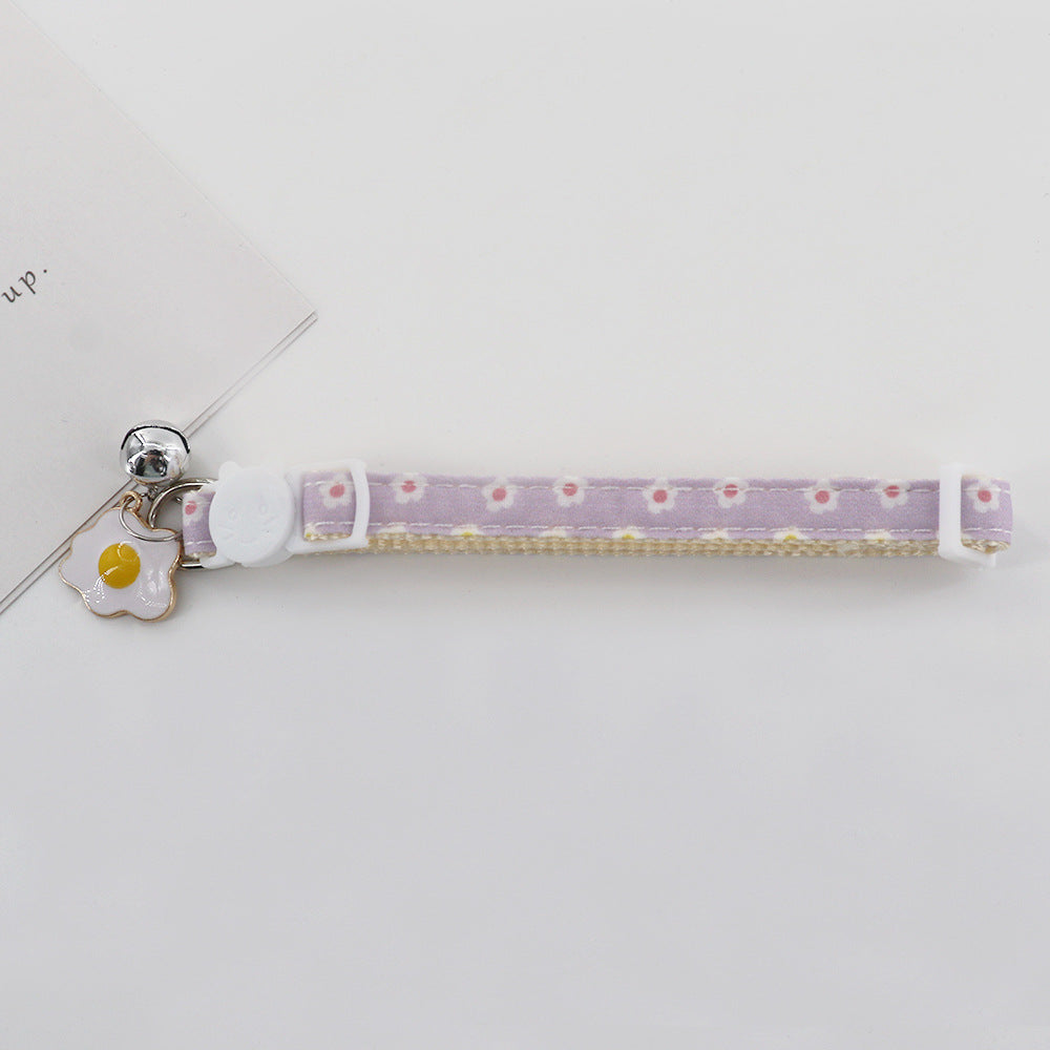 Purple Flowers pet collar with cat-shaped slider, bell, and flower charm