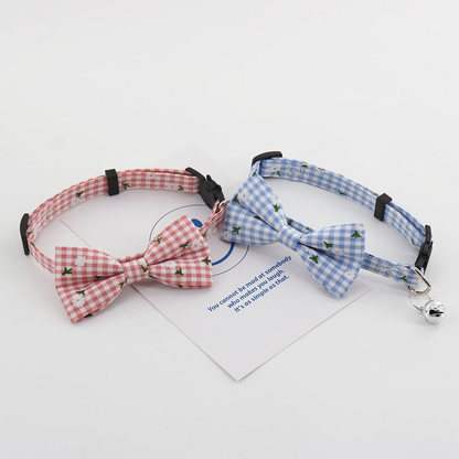 Red and Sky Blue gingham pet collars with bows and bells displayed together