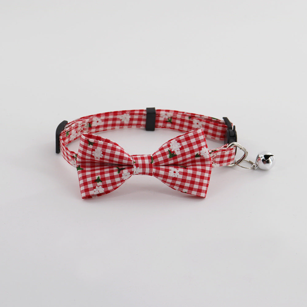 Red gingham pet collar with bow and bell, front view