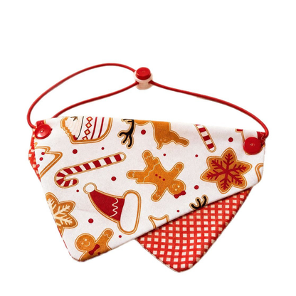 Multicolor Christmas pet neckwear bandana bib with overlapping triangular panels and a red neck cord