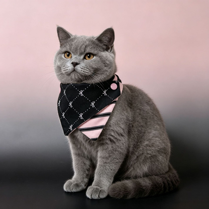Diamond Dots pet neckwear with a black dotted pattern and pink striped panel, worn by a gray cat