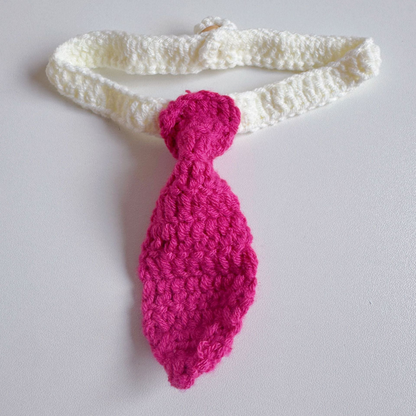Fuchsia tie-shaped pet neckwear with a white looped strap