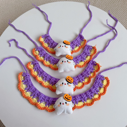 Multiple ghost pet neckwear pieces with long purple tie ends displayed together