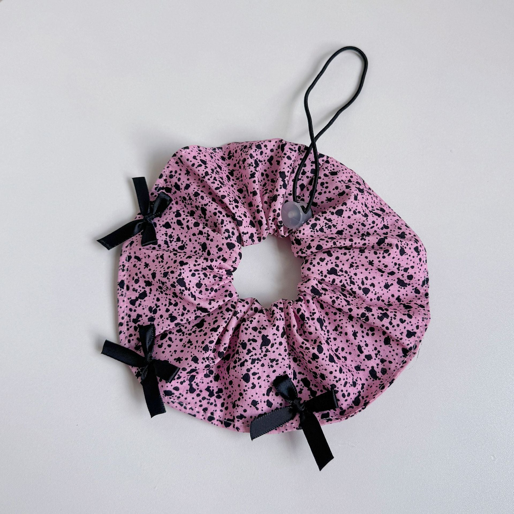 Speckles pet neckwear with black ribbon bows