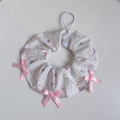 Character Checks pet neckwear with character print and pink ribbon bows