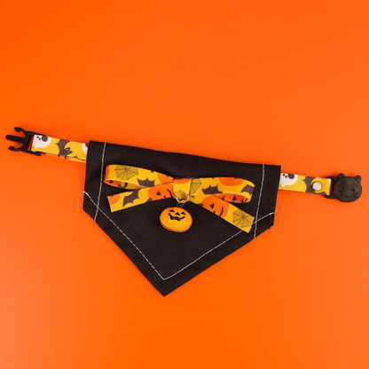 Orange Ghost pet neckwear with an orange patterned bow and pumpkin charm