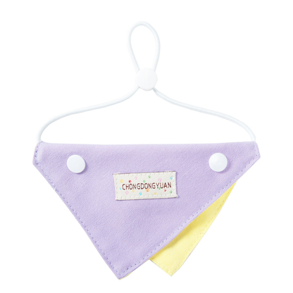 Purple triangular pet neckwear with a yellow contrasting panel, front view