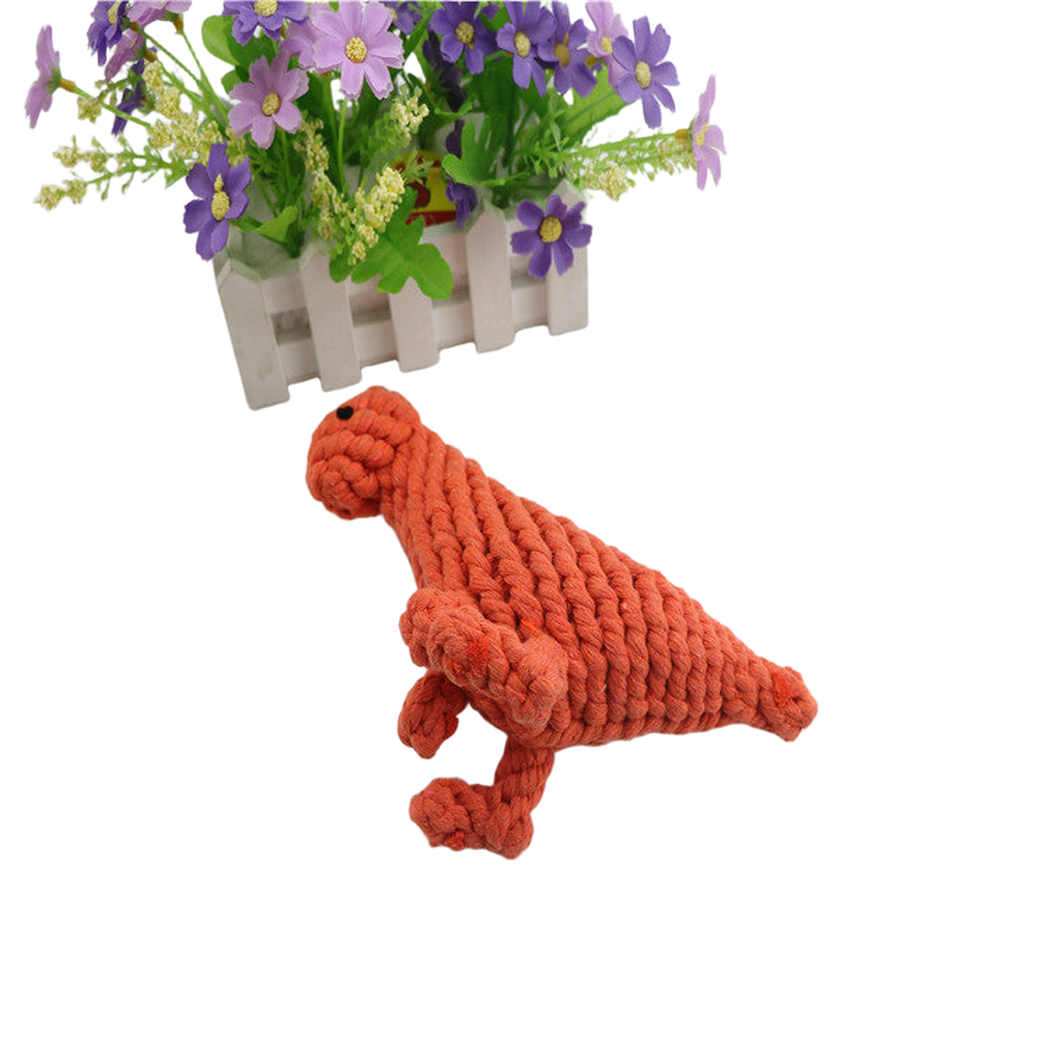 Orange-red braided dog toy with a long tapered tail, angled view