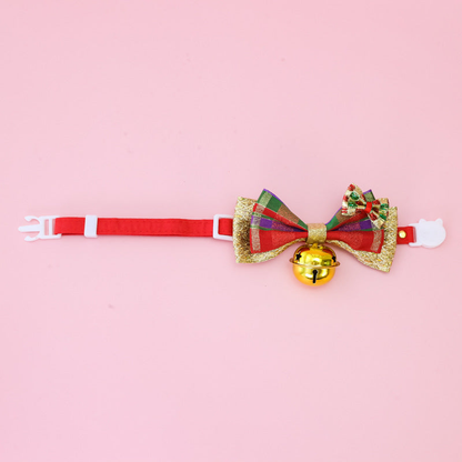 Red pet collar with a plaid bow and gold-tone bell, full strap view