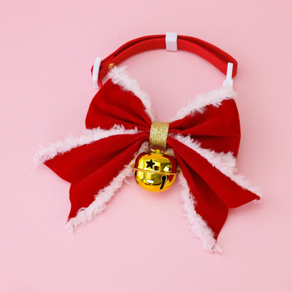 Bow+Gold pet collar with red bow, white buckle, and hanging gold-tone bell