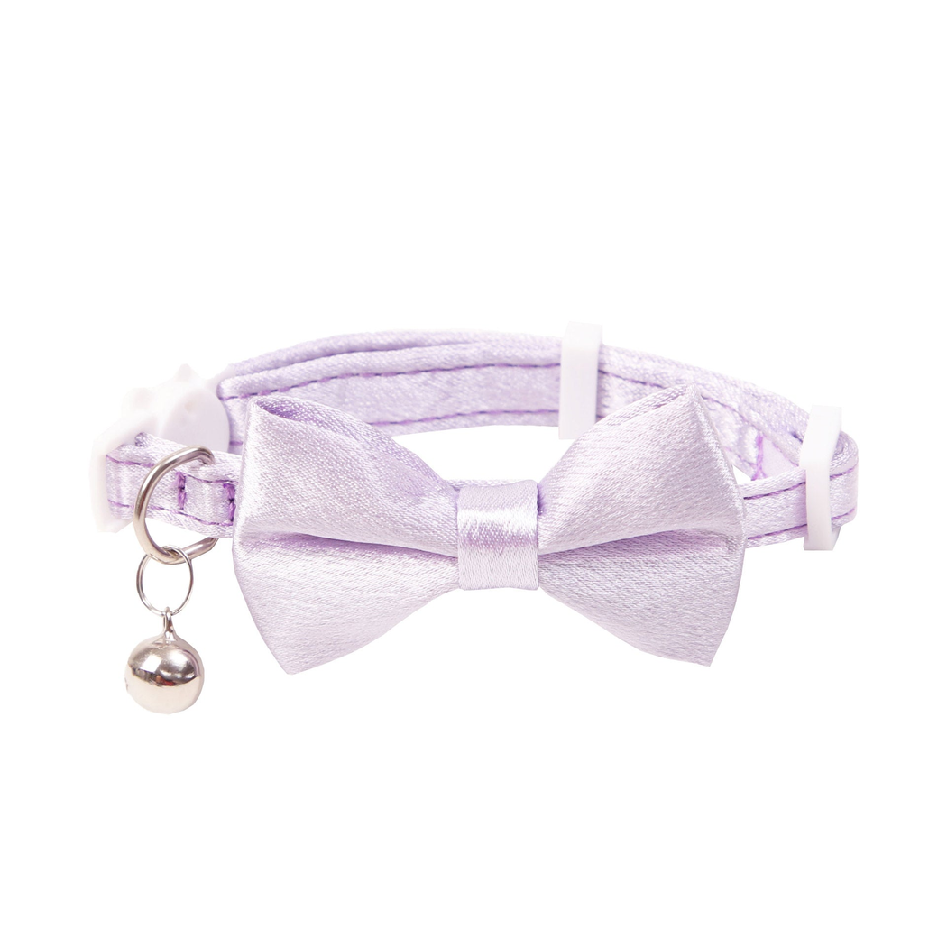 Light purple cat collar with a front bow and hanging bell