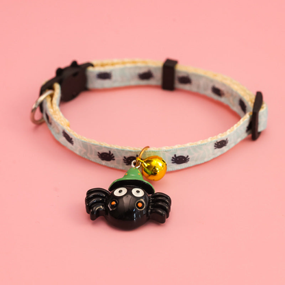 Spider Style pet collar with black spider pattern, bell, and spider charm